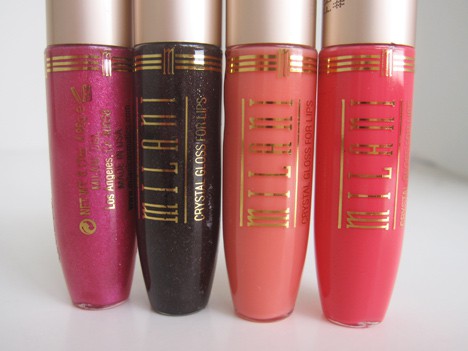 5 Crystal Glosses voor lippen in Pucker Up, Fruit Punch, Raspberry Icing, Sheer Dark Honey en Clear shades