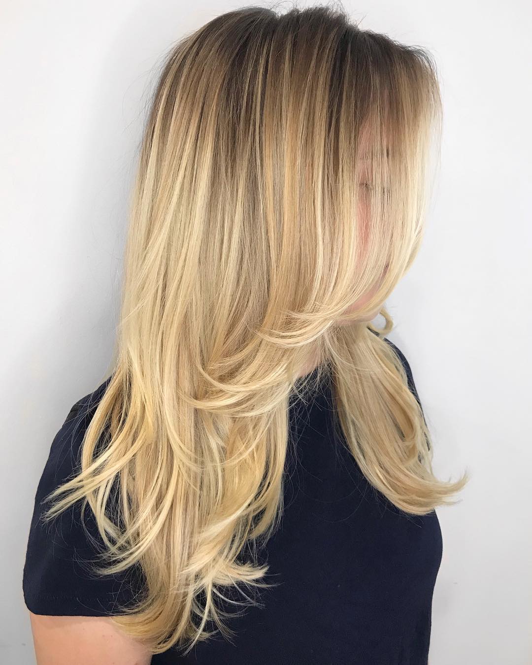 Blond kapsel met lagen voor lang haar