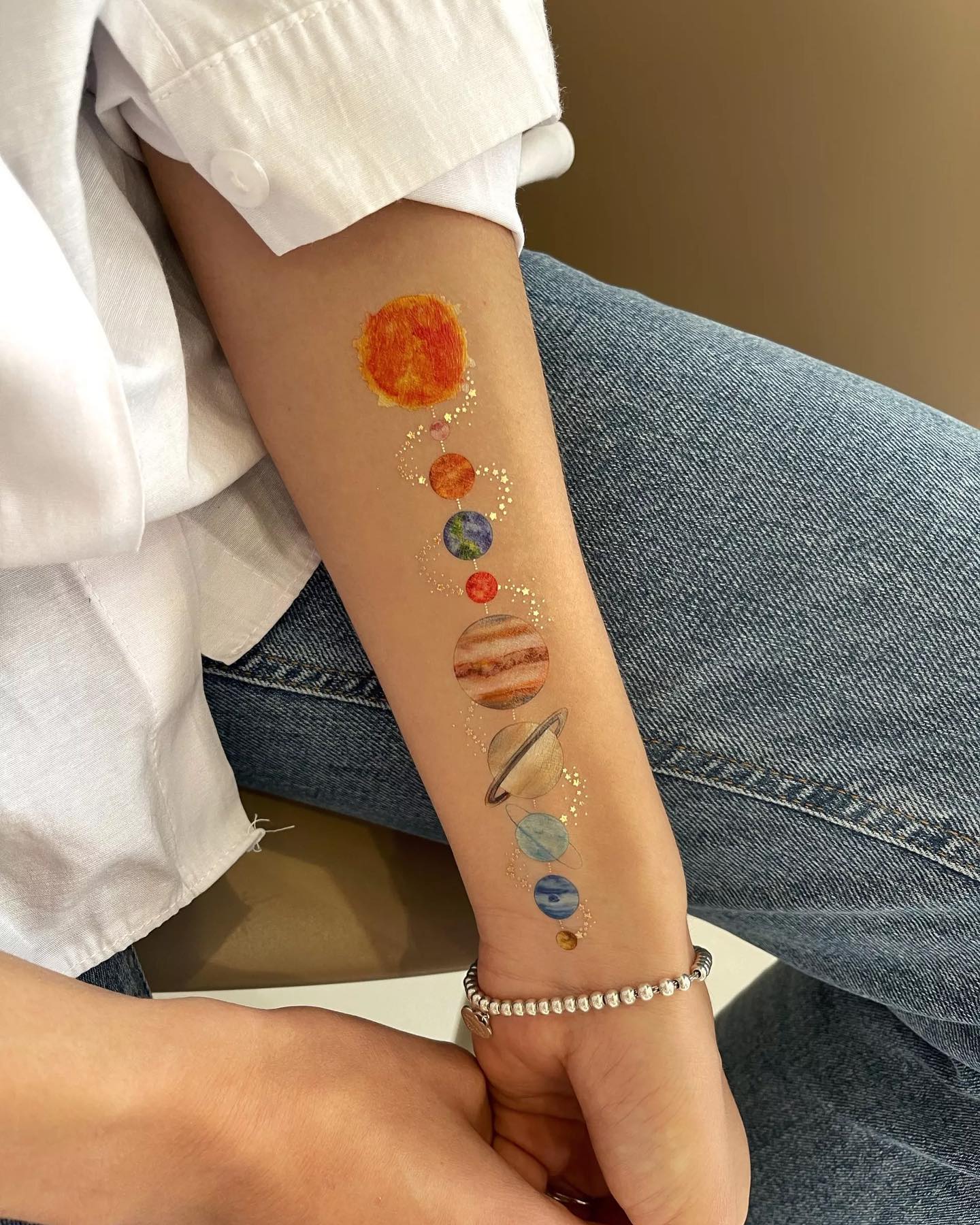 Planeten Tijdelijke Tattoo op Arm