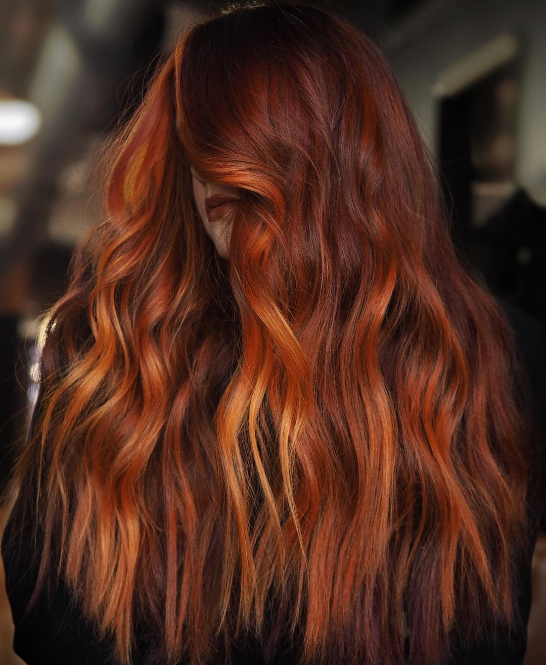 Lang rood haar met oranje highlights