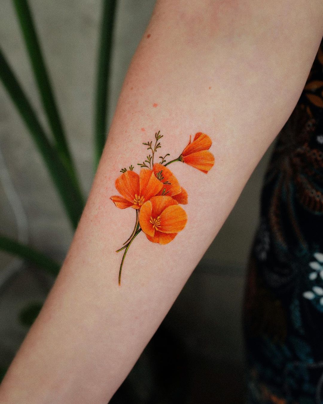 Rode Papaver Bloem Tattoo op Arm