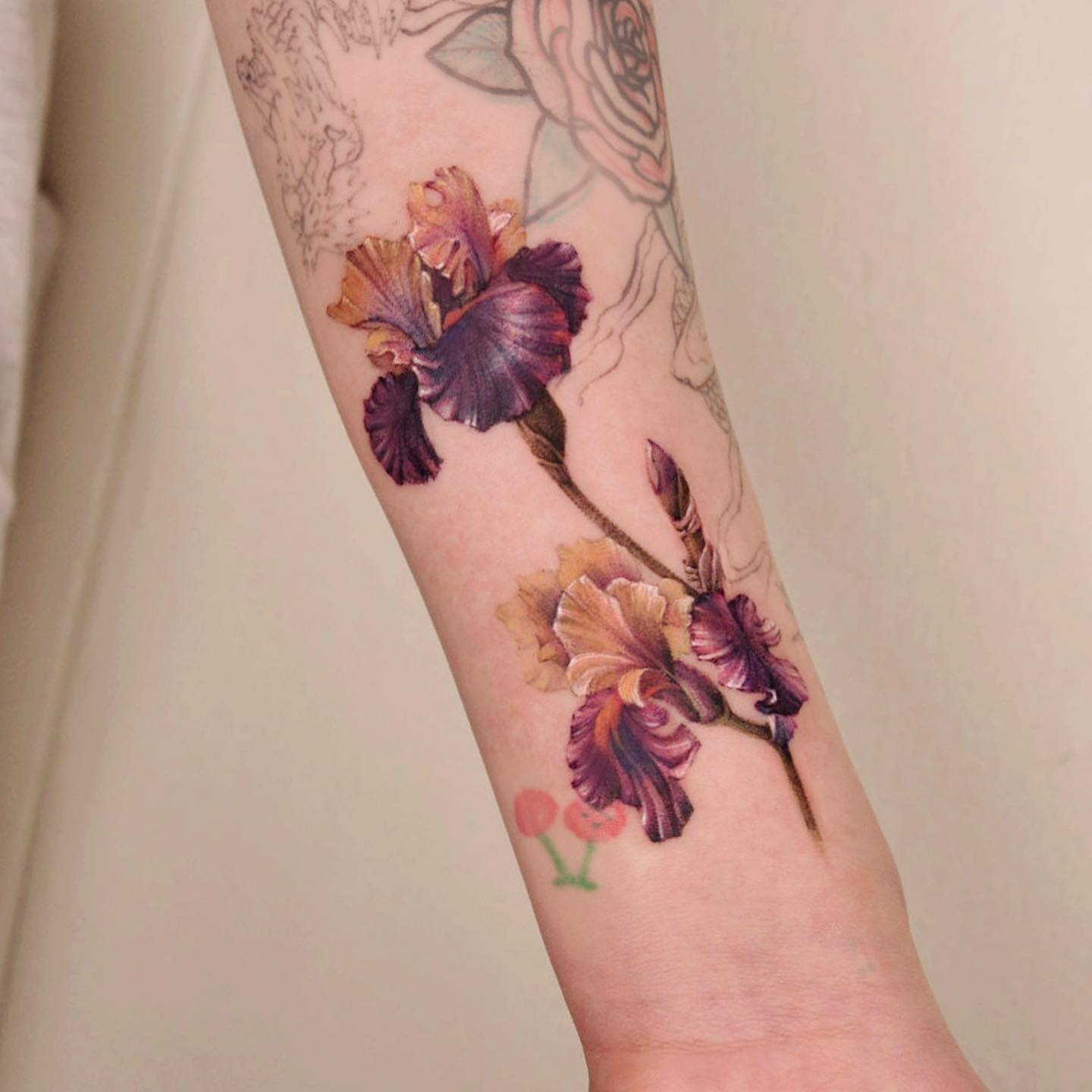 Kleur Iris Tattoo op Arm